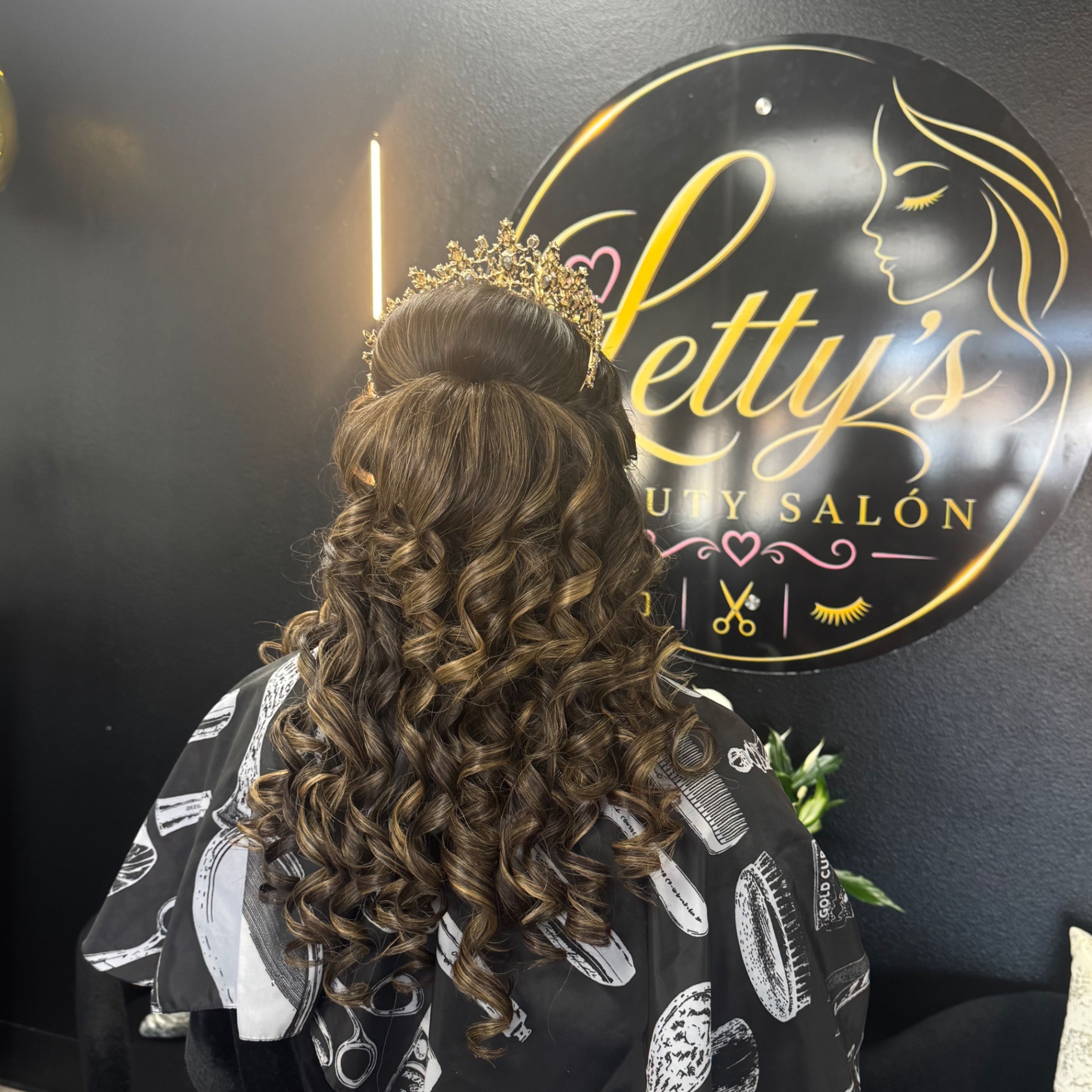 Half-up curled style with tiara